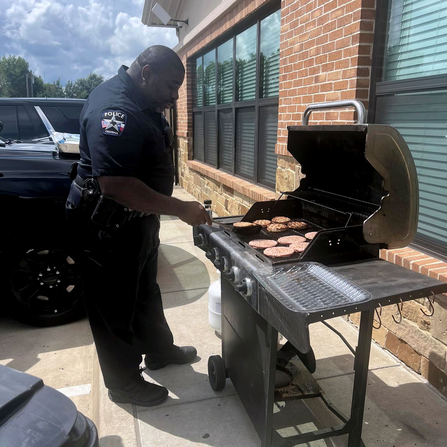 Detective Henri Grilling Hot Dogs