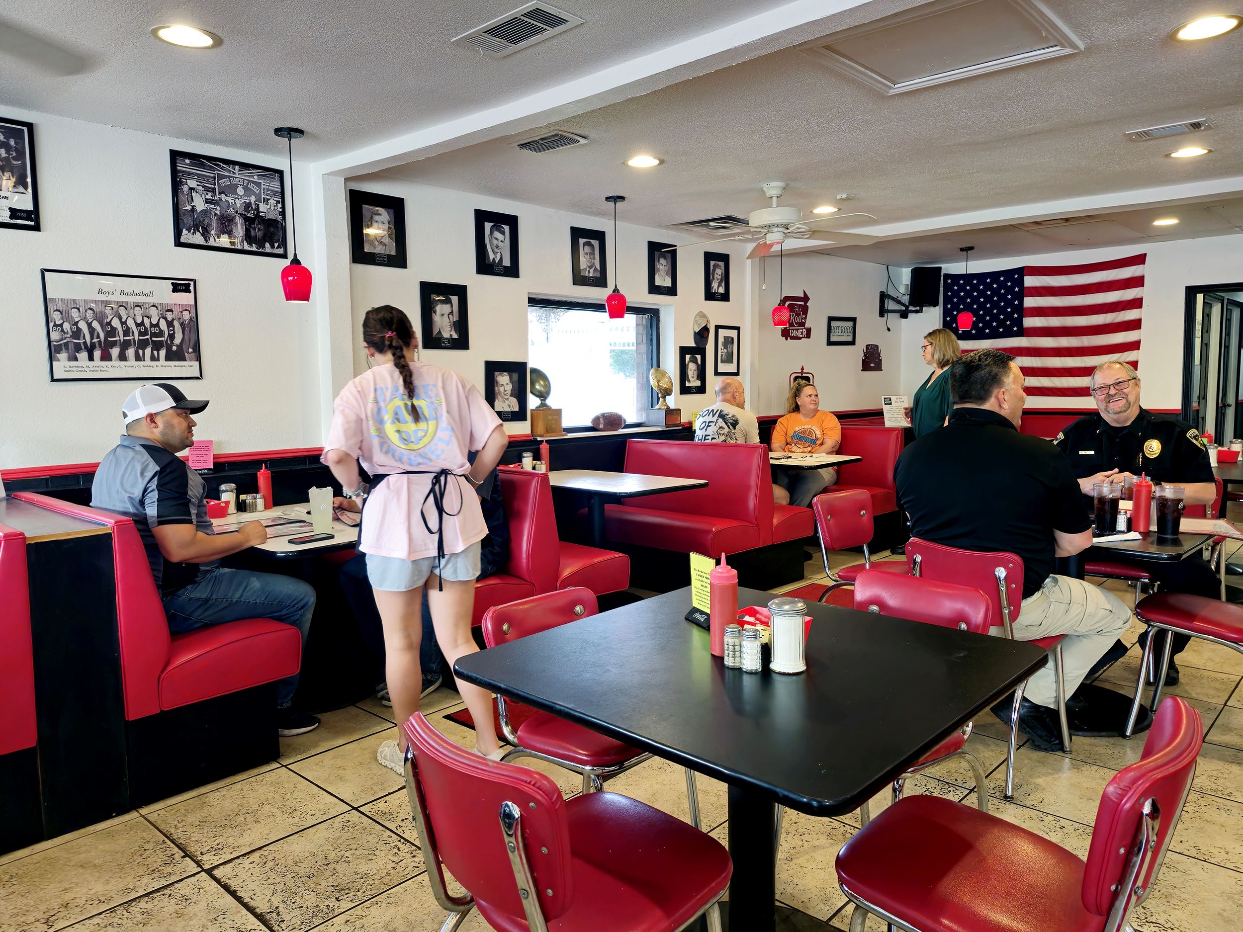 Customers and waitresses at Hot Rodz Diner